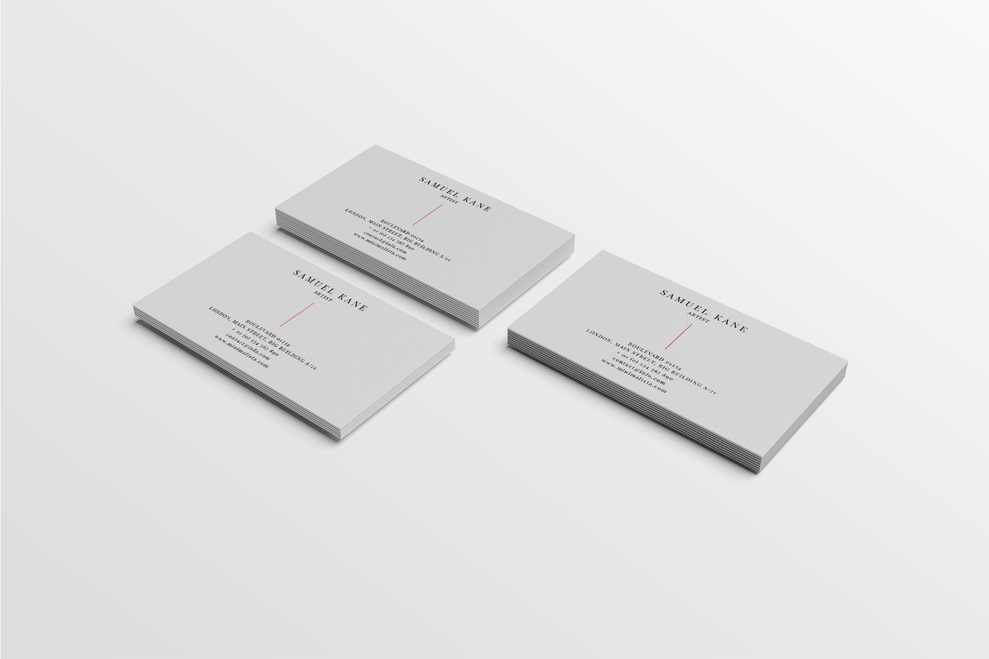 Three gray business cards with text on a white background