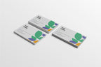Three business cards with a leaf design on a white background