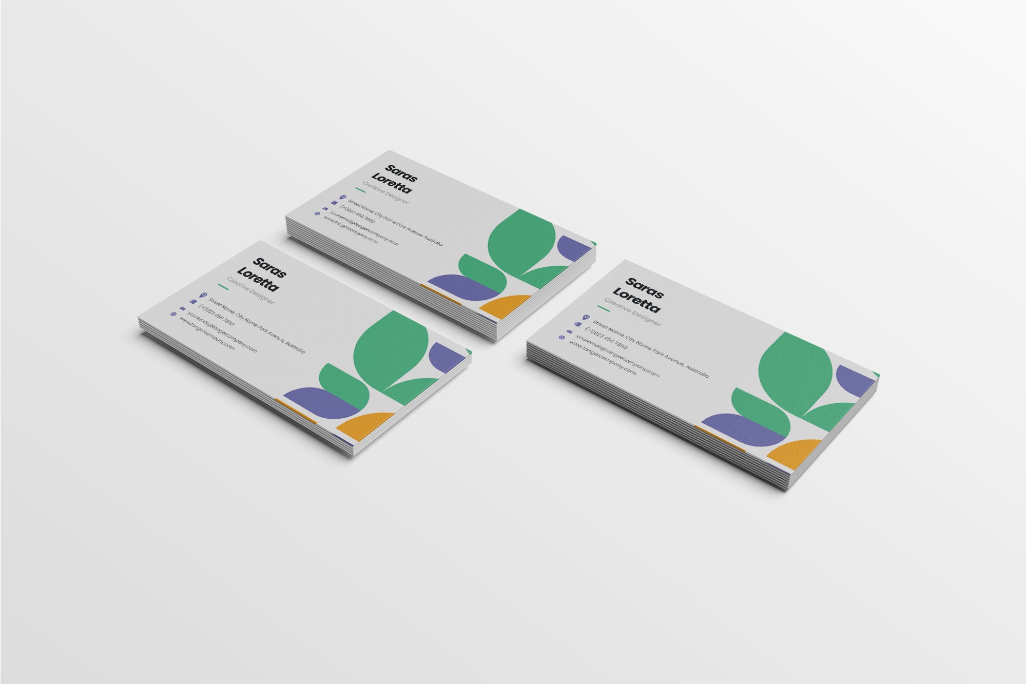 Three business cards with a leaf design on a white background