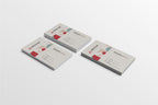 Three business cards with geometric design on a white background