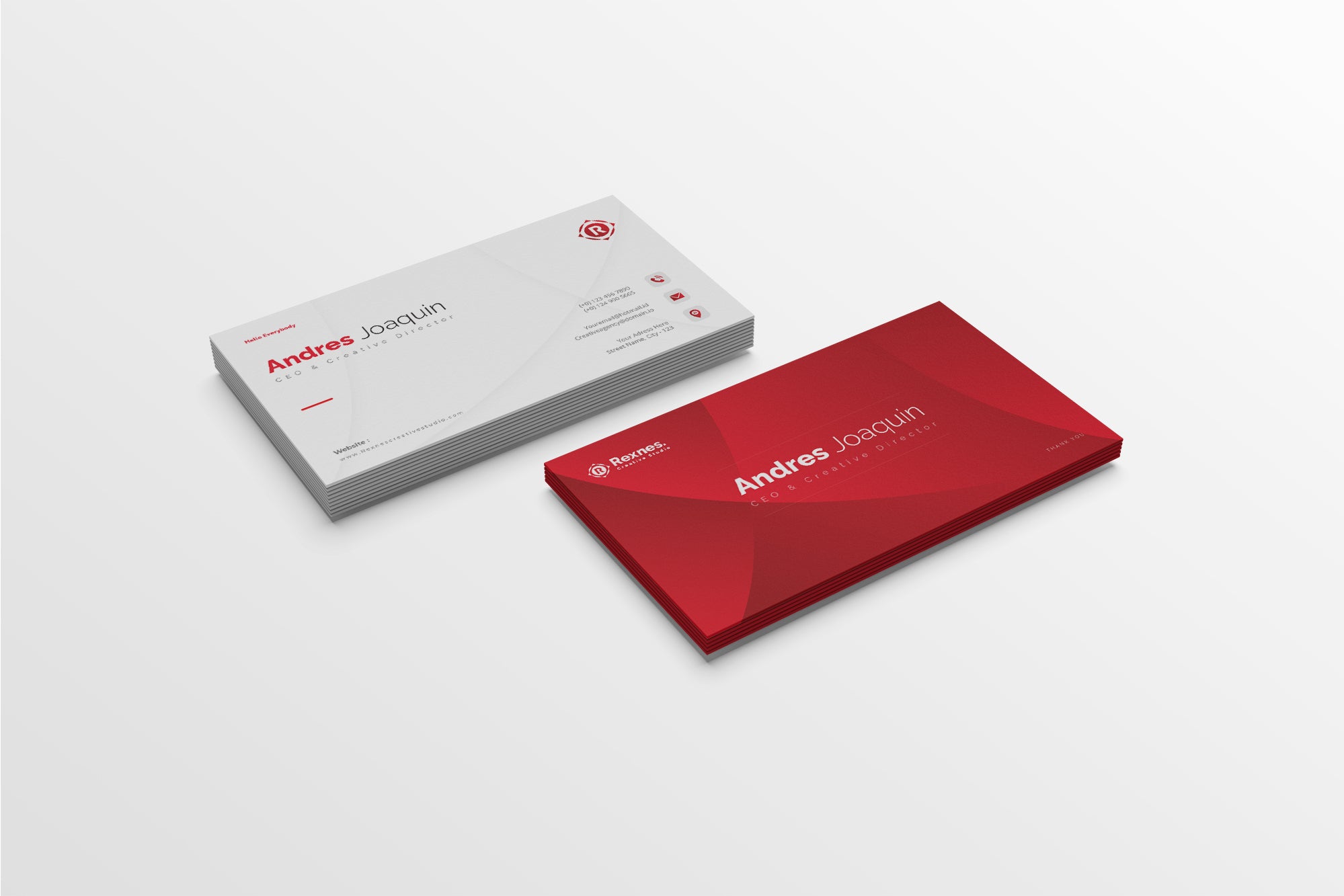 Red and gray business cards with 'Andres Joaquin' branding on a white background