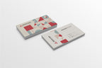 Two business cards with geometric design on a white background