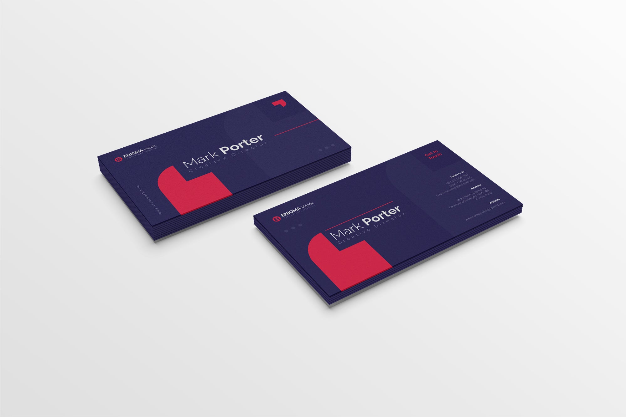 Two Mark Porter business cards on a light gray background