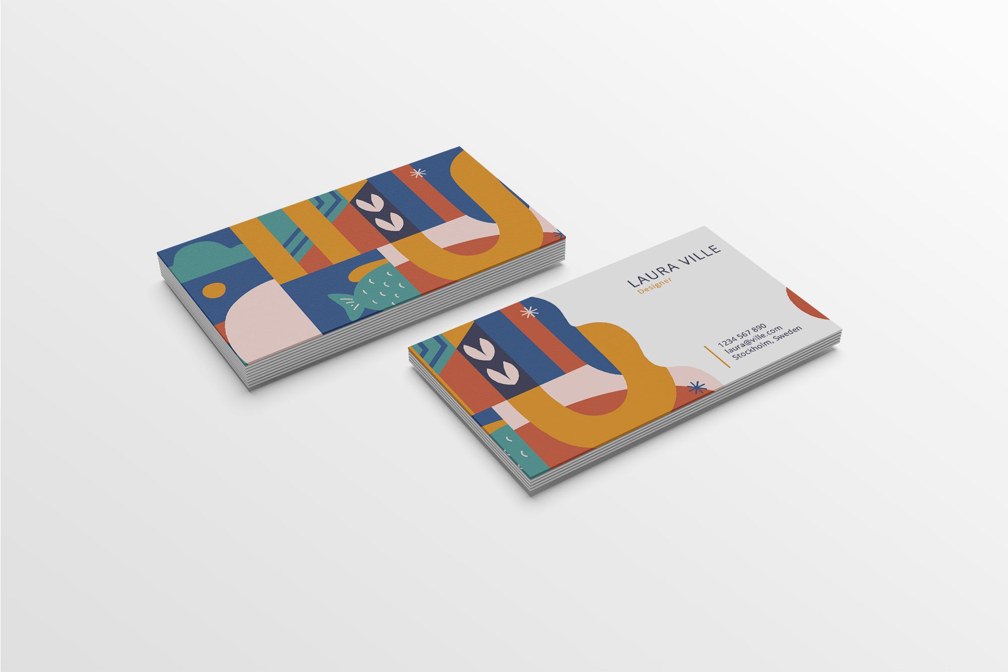 Two colorful business cards with abstract designs on a white background